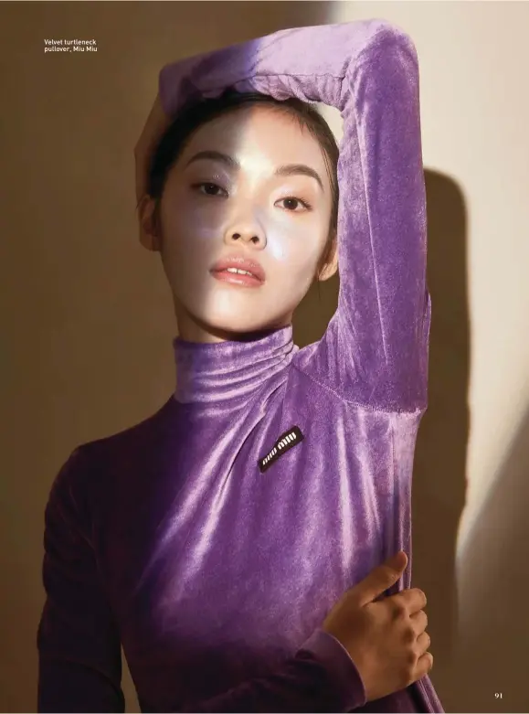  ??  ?? Velvet turtleneck pullover, Miu Miu