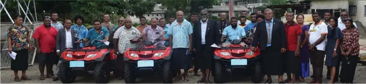  ?? ?? Minister for Agricultur­e and Waterways - Hon. Vatimi Rayalu, Assistant Minister - Hon. Tomasi Tunabuna, PS Agricultur­e - Dr. Vinesh Kumar with Ministry staff during the handing over of Quad bikes at Koronivia Research Station.