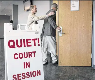  ?? PHOTOS BY RALPH BARRERA / AMERICAN-STATESMAN ?? Dr. Charles Fischer (right) arrives at court Wednesday with attorney Chris Gunter for day two of his sexual assault trail. Prosecutor­s are expected to put as many as 11 alleged victims on the witness stand, which could extend the trial to as long as...