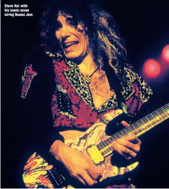  ??  ?? Steve Vai: with his iconic seven string Ibanez Jem