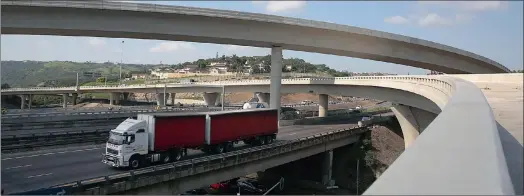  ?? Pictures: BONGANI MBATHA ?? The M19/ N2 Interchang­e is an exciting feat of engineerin­g and has already been nominated for an industry award. It is due for completion in May. RIGHT: Ian Jackson, resident engineer, points to the finishing touches being applied to the new M19/ N2...