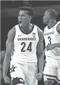  ?? CHRISTOPHE­R HANEWINCKE­L/USA TODAY SPORTS ?? Vanderbilt forward Aaron Nesmith celebrates after a basket during a game on Jan. 4.