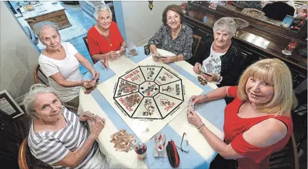  ?? CATHIE COWARD THE HAMILTON SPECTATOR ?? Donna Castellani's mother and friends have been meeting to play Rummoli since she was a toddler (and she's almost 70). Now Donna plays, too, and some of the originals are in their 90s. From left, Maria Perrins, Lena Anderson, Theresa Travale, Vincie Travale, Rose Castellani and Donna.