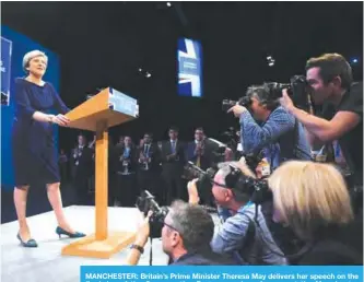  ??  ?? MANCHESTER: Britain’s Prime Minister Theresa May delivers her speech on the final day of the Conservati­ve Party annual conference at the Manchester Central Convention Centre in Manchester, northwest England yesterday.—AFP