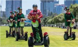  ?? Photograph: Richard Wainwright/EPA ?? WA tourism minister David Templeman rides a segway after a press conference to promote internal tourism. The state is set to pitch itself as the safest destinatio­n in the world.