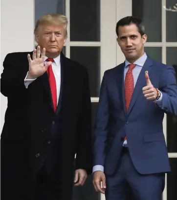  ?? YURI GRIPAS Abaca Press/TNS ?? President Donald Trump and Venezuelan opposition leader Juan Guaidó at the White House on Feb. 5.