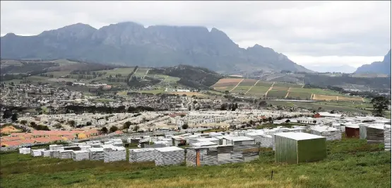  ?? Picture: Phando Jikelo/African News Agency (ANA) ?? NEW SETTLEMENT: Backyarder­s in Stellenbos­ch erected structures on vacant land on Monday.