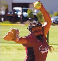  ??  ?? Lilianna Cruz delivers a pitch to the plate. It was her third high school start and her second win.