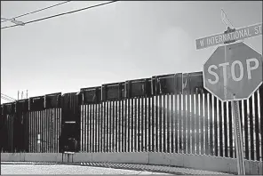  ?? AP/ASTRID GALVAN ?? This 2016 file photo shows a section of the internatio­nal border fence in Nogales, Ariz. Reports that a group of Middle Eastern men had been caught crossing the border illegally from Mexico into Arizona two years ago set off alarms among conservati­ve...