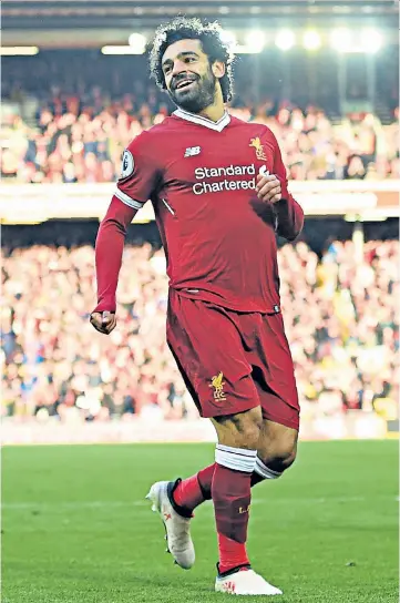  ??  ?? On fire: Mohamed Salah continued his stunning season for Liverpool by scoring one goal and setting up another against West Ham
