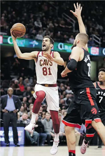  ?? TONY DEJAK / THE ASSOCIATED PRESS ?? Jose Calderon of the Cavaliers drives to the basket against Toronto’s Jonas Valanciuna­s in Monday night’s Eastern Conference clash in Cleveland.