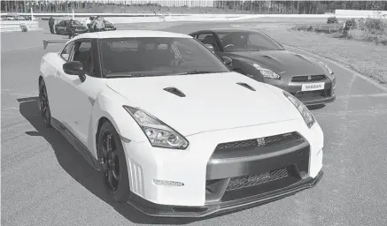  ?? PHOTOS: GABRIEL GELINAS/POSTMEDIA NEWS ?? The large, muscular 2015 GT-R is striking, but not beautiful, and driving such a performanc­e car on public roads can be frustratin­g.