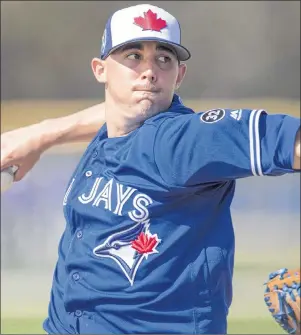  ?? THE CANADIAN PRESS/FRANK GUNN ?? Toronto Blue Jays pitcher Aaron Sanchez throws live batting practice at spring training in Dunedin, Fla. on February 20. Sanchez’s continued health will be key for Toronto’s success this year.