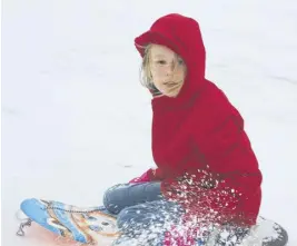  ?? LYNN CURWIN/TRURO NEWS ?? Katala Centa, 10, enjoyed sledding on the legion hill during her visit to Truro. Sliding down a snowy hill was a new experience for the Australian girl.