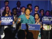  ?? ALYSSA POINTER / ALYSSA.POINTER@AJC.COM ?? Ex-state Rep. Stacey Abrams, the Democrats’ candidate for governor, speaks Saturday at the Georgia Democratic Convention.