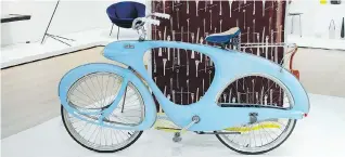  ??  ?? A robin’s-egg blue bike achieves iconic status as an example of good design at The Value of Good Design exhibit at the Museum of Modern Art in New York.