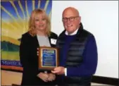  ?? FRAN MAYE - DIGITAL FIRST MEDIA ?? Dick Sanford accepts a Longwood Rotary Club Community Service Excellence Award from Tammy Duering, president of the Longwood Rotary Club.