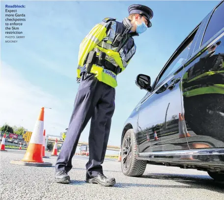  ?? PHOTO: GERRY MOONEY ?? Roadblock: Expect more Garda checkpoint­s to enforce the 5km restrictio­n