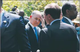  ?? AP/EVAN VUCCI ?? Environmen­tal Protection Agency administra­tor Scott Pruitt, the focus of at least 10 formal investigat­ions into his activities, mingles Thursday at a National Day of Prayer event at the White House.