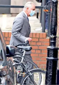  ?? — AFP photo ?? Prince Charles arrives at the rear entrance to King Edward VII hospital where Prince Philip was admitted.