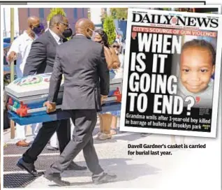  ??  ?? Davell Gardner’s casket is carried for burial last year.