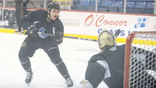  ?? JASON MALLOY • THE GUARDIAN ?? Brendan Mccarthy fires a shot on goal during a Charlottet­own Islanders practice before they departed for Quebec to compete in the Quebec Major Junior Hockey League playoffs.