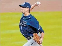  ?? KATHY WILLENS
THE ASSOCIATED PRESS FILE PHOTO ?? The MLB season will end, presumably, with one team hoisting a trophy in a nearly empty stadium in Texas, appropriat­e for a season Charlie Morton says has “a real sterile feel to it.”