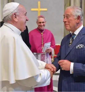  ??  ?? Smiles: Charles meets Pope Francis at the Vatican yesterday