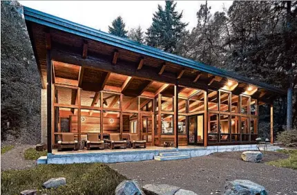  ?? DALE CHRISTOPHE­R LANG/THE TAUNTON PRESS ?? This Vashon Island, Wash., house, built with structural insulated panels and a timber frame, was designed by FabCab and is 1750 square feet.