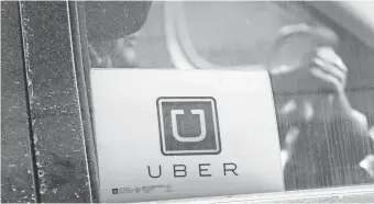  ?? SETH WENIG, AP ?? Uber drivers say they often spend long hours behind the wheel.