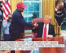  ??  ?? US President Donald Trump meets with rapper Washington, DC, on October 11.