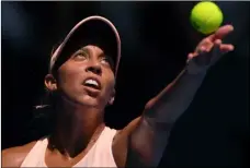  ?? AP PHOTO ?? United States’ Madison Keys serves to France’s Caroline Garcia during their fourth round match at the Australian Open tennis championsh­ips in Melbourne, Australia, late Sunday night.