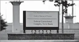  ?? MICHAEL CONROY/AP ?? The Federal Bureau of Prisons has carried out eight federal executions this year after a 17-year hiatus. Above, a sign for the federal correction­al complex in Terre Haute, Indiana.