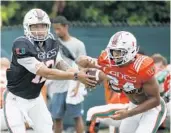  ?? WILFREDO LEE/ASSOCIATED PRESS ?? QB Malik Rosier, left, and RB Travis Homer are two reasons why the offense should be a strength.