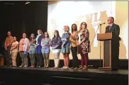  ?? JEREMY P. KELLEY / STAFF ?? Xenia Schools Personnel Director Michael Earley introduces newly hired teachers and principals at a school-year kickoff event Thursday.