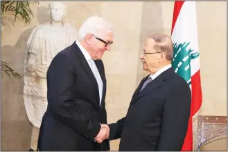  ??  ?? In this photo released by Lebanon’s official government photograph­er Dalati Nohra, Lebanese President Michel Aoun (right), shakes hands with German Foreign Minister Frank-Walter Steinmeier (left), at the presidenti­al palace, in Baabda east of Beirut,...