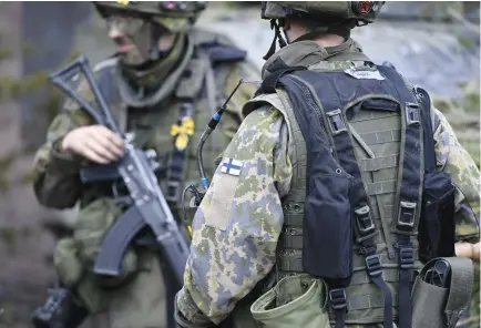  ?? (Lehtikuva/Heikki Saukkomaa via Reuters) ?? FINNISH SOLDIERS take part in the Army mechanized exercise Arrow 22 earlier this month.