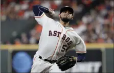  ?? ERIC GAY - THE ASSOCIATED PRESS ?? Houston Astros relief pitcher Roberto Osuna throws against the New York Yankees during the eighth inning in Game 2 of the American League Championsh­ip Series Sunday, Oct. 13, 2019, in Houston.