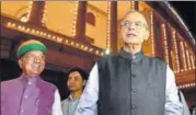  ?? PTI ?? Finance Minister Arun Jaitley with MoS Arjunram Meghwal leaves after the launch of GST on Saturday.