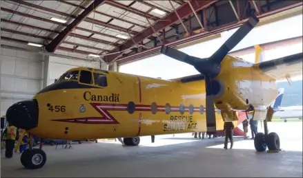  ?? ANDREA PEACOCK/The Okanagan Saturday ?? A Royal Canadian Air Force CC-115 Buffalo search and rescue plane sits in a hangar at KF Aerospace.The company was awarded two contracts, worth $30 million, to maintain six of these planes and four CC-138 Twin Otter aircraft.