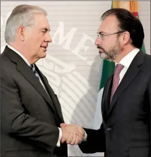  ?? AP/ REBECCA BLACKWELL ?? U. S. Secretary of State Rex Tillerson ( left) and Mexican Foreign Affairs Minister Luis Videgaray meet Thursday in Mexico City, where Videgaray said “immigratio­n policy can’t be unilateral.”