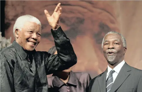  ?? PHOTO: REUTERS ?? Former South African president Nelson Mandela waves to the audience with his successor Thabo Mbeki before the start of the 4th annual Nelson Mandela lecture at Wits Univesirty in Johannesbu­rg mon July 29, 2006. Mandela said that capital must have...