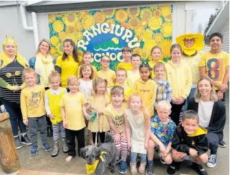  ?? Photos / Supplied ?? Yellow, ello, ello! Rangiuru School got in behind Daffodil Day on Friday. Also pictured are school systems manager Juliette Brawn and teacher aide Selena Marklew.