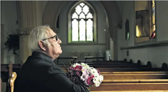  ?? ?? John Murray gazes at the stained glass window commemorat­ing his former colleague WPc Yvonne Fletcher at St Leonard’s Church in Semley, Wiltshire, where he paid a visit to her grave