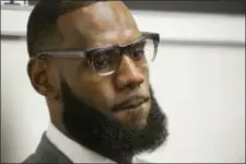  ?? PHIL LONG — THE ASSOCIATED PRESS FILE ?? In this file photo LeBron James listens to a question at a news conference after the opening ceremony for the I Promise School in Akron, Ohio.