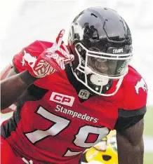  ?? AMBER BRACKEN/ THE CANADIAN PRESS ?? Stampeders receiver Richard Sindani celebrates a touchdown in preseason action against the Edmonton Eskimos. Sindani is among a strong group of Canadian receivers.