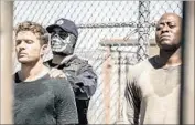  ?? Isabella Vosmikova USA ?? BOB LEE AND ISAAC (Ryan Phillippe, left, and Omar Epps) are in a Mexican prison on “Shooter.”