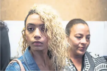  ?? Picture: Jacques Nelles ?? SPORTING HER SCAR. Gabriella Engels and her mother Debbie at the High Court in Pretoria yesterday.