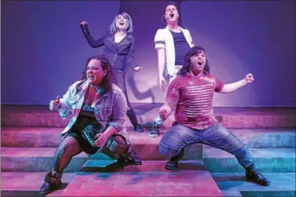  ?? ANDY DUDIK ?? Kate Michalski, left, Neely Gevaart, Danny Simpson, and Tony Heffner perform in the Blank Canvas Theatre production of “We Will Rock You.”