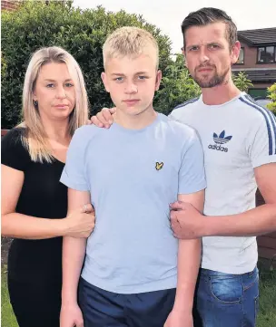  ??  ?? ●●Charlie Albiston with parents Chris and Rachael